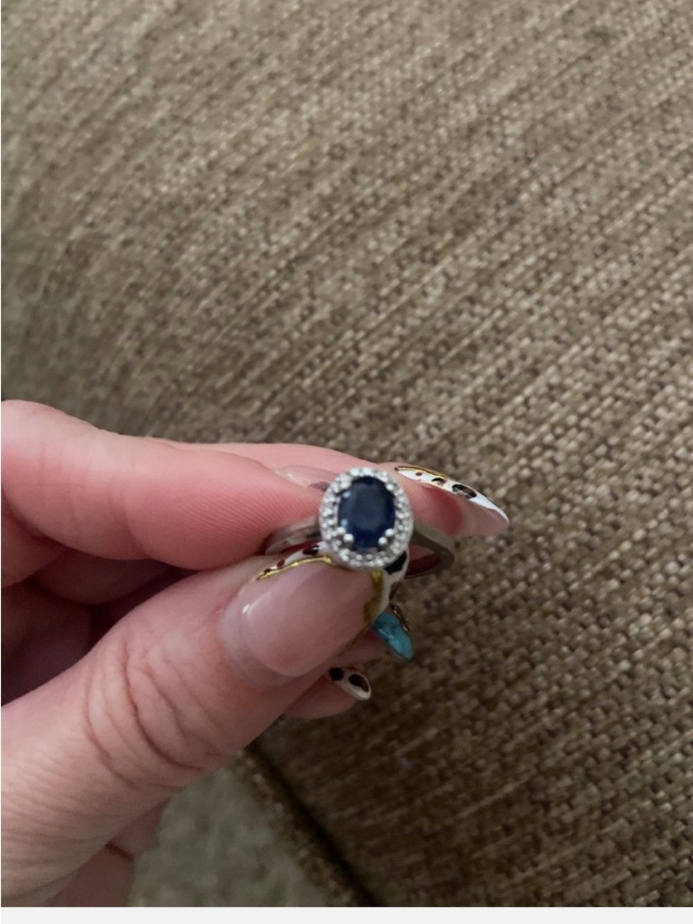 Elegant Sapphire Oval Halo Ring with Diamond Accent in Sterling Silver - Picture 3 of 3